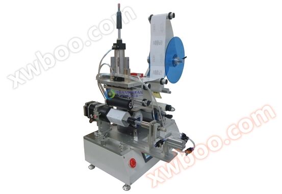 Semi automatic 360 degree rotating labeling machine; Sewing agent labeling machine